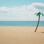 green artificial palm tree on seashore