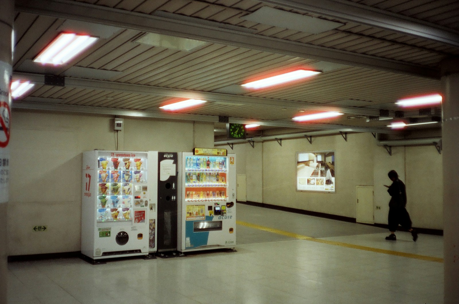 Vending machines in a subway station passage.